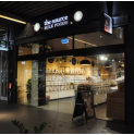 Combination of framed/frameless shopfront