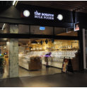 Combination of framed/frameless shopfront