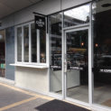 Aluminium Shopfront with Half Bi-Fold Doors
