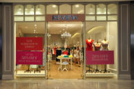Frameless Glass Shopfront with Wood Detail Applied Afterwards